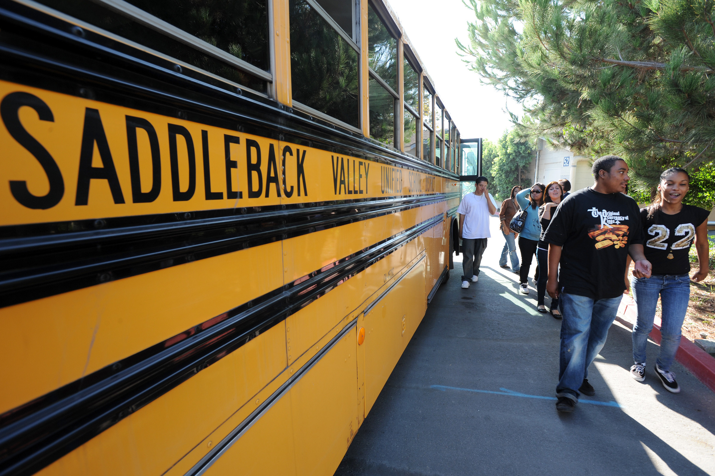 Students from Saddleback Valley Unified School District exit bus